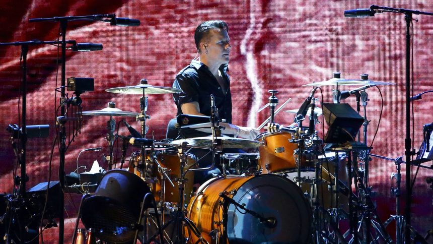 Larry Mullen Jr. of U2 performs at the National Stadium in Singapore on November 30, 2019.