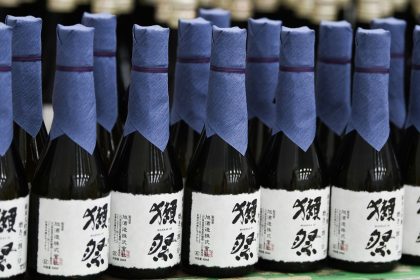 Bottles of Dassai 23 sake are seen at Asahi Shuzo Co's facility in Iwakuni, Yamaguchi Prefecture, Japan, on July 7, 2022.