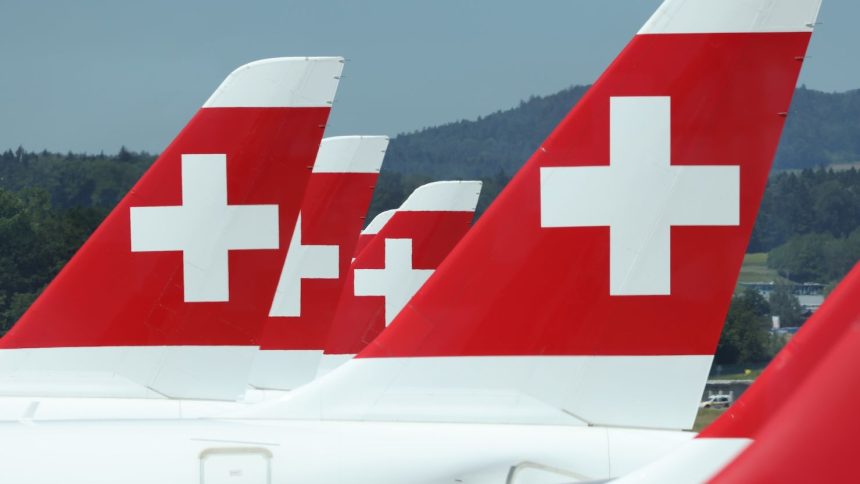 Swiss International Air Lines passenger planes stand on the tarmac at Zurich Airport on June 14, 2021.