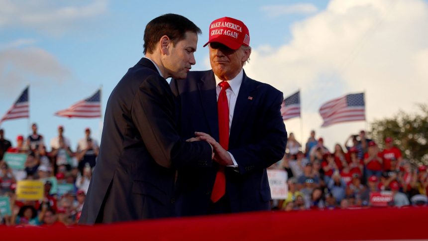 Sen. Marco Rubio, left, stands with former President Donald Trump, who has picked him to be secretary of state in the second Trump administration.