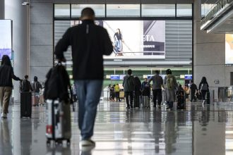 Travelers at Hongqiao International Airport in Shanghai, China. Shanghai is mainland China's biggest city as well as the most visited by tourists.