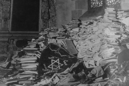 These looted Jewish books and altar cloths, pictured in April 1945, were stored by the Nazis in a church in Germany.