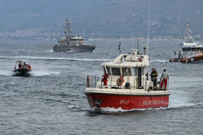 Rescue boats return to Porticello harbor near Palermo following the discovery of bodies on August 21, 2024, two days after the British-flagged luxury yacht Bayesian sank.