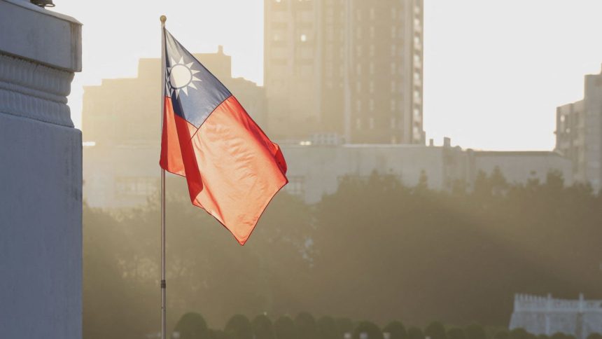 A Taiwanese flag flies at the Chiang Kai-shek Memorial Hall in Taipei on October 15, 2024.