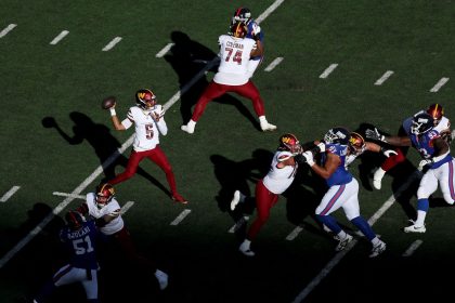 Jayden Daniels looks to pass against the New York Giants.