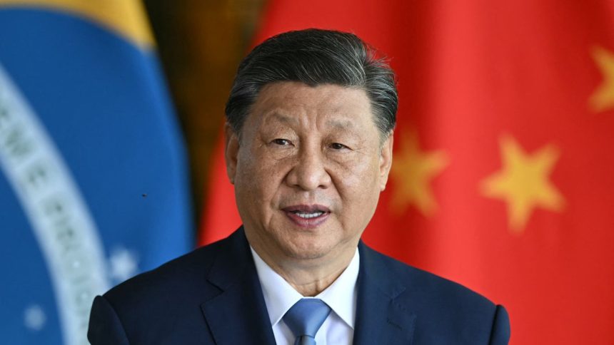 China's President Xi Jinping speaks as he and Brazil's President Luiz Inacio Lula da Silva give a joint statement to the press after a meeting at Alvorada Palace in Brasilia on November 20, 2024. China's President Xi Jinping is on a state visit to Brazil, fresh off a warm reception at summits of the G20 and APEC groups, both held under the cloud of Donald Trump's White House return. (Photo by EVARISTO SA / AFP) (Photo by EVARISTO SA/AFP via Getty Images)