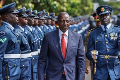 Kenyan President William Ruto inspects a ceremonial honor guard following his arrival at the Parliament buildings where he will deliver a State of the Nation address in Nairobi on November 21, 2024.