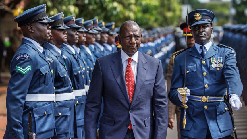 Kenyan President William Ruto inspects a ceremonial honor guard following his arrival at the Parliament buildings where he will deliver a State of the Nation address in Nairobi on November 21, 2024.