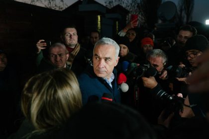 Romanian presidential candidate Calin Georgescu speaks to the media on November 26.