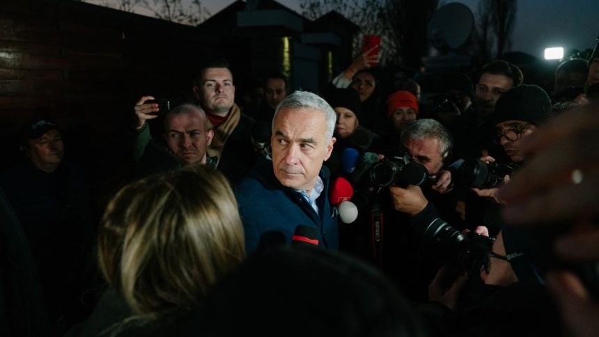 Romanian presidential candidate Calin Georgescu gives a statement to media in the village of Izvorani on November 26, 2024.