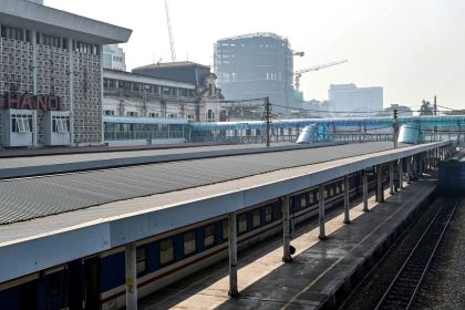 Passenger trains are parked at Hanoi Railway Station in Hanoi on November 30, 2024. Vietnam will build a $67 billion high-speed railway from Hanoi to Ho Chi Minh City, after the country's rubber-stamp parliament gave the go-ahead to the long-awaited project on November 30. (Photo by Nhac NGUYEN / AFP) (Photo by NHAC NGUYEN/AFP via Getty Images)