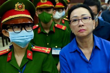 Truong My Lan (R) looks on at a court in Ho Chi Minh City on December 3, 2024.