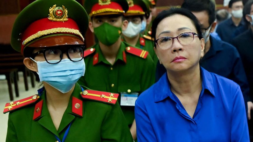 Truong My Lan (R) looks on at a court in Ho Chi Minh City on December 3, 2024.