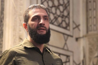 Leader of Syria's Islamist Hayat Tahrir al-Sham (HTS) group, Abu Mohammed al-Jolani, address a crowd at the capital's landmark Umayyad Mosque on December 8.