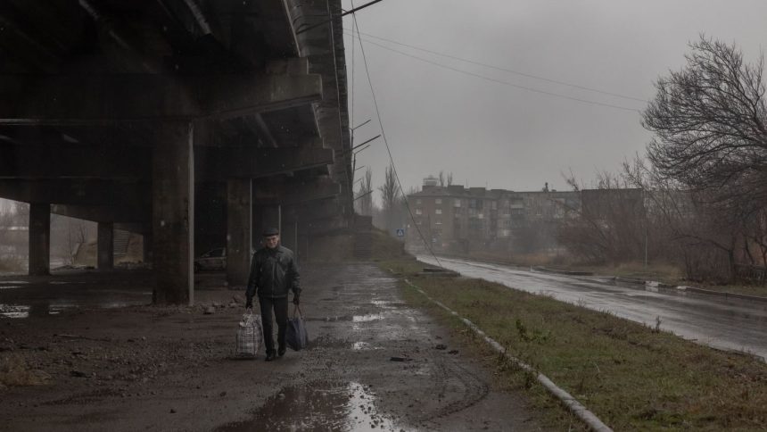 A pedestrian on the streets in Pokrovsk, in the the eastern Donetsk region of Ukraine, on December 11, 2024.