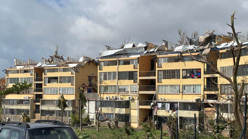 A photo taken on December 15, 2024 shows torn-off roofs of residential buildings after the cyclone Chido hit France's Indian Ocean territory of Mayotte.