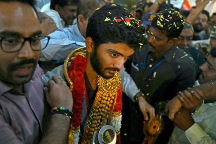 Gukesh Dommaraju is welcomed home upon his arrival at the Chennai International Airport on December 16 after his win at the FIDE World Chess Championship in Singapore.