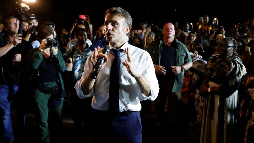 French President Emmanuel Macron speaks to the local residents during his visit in Pamandzi, on the French Indian Ocean territory of Mayotte on December 19, 2024.