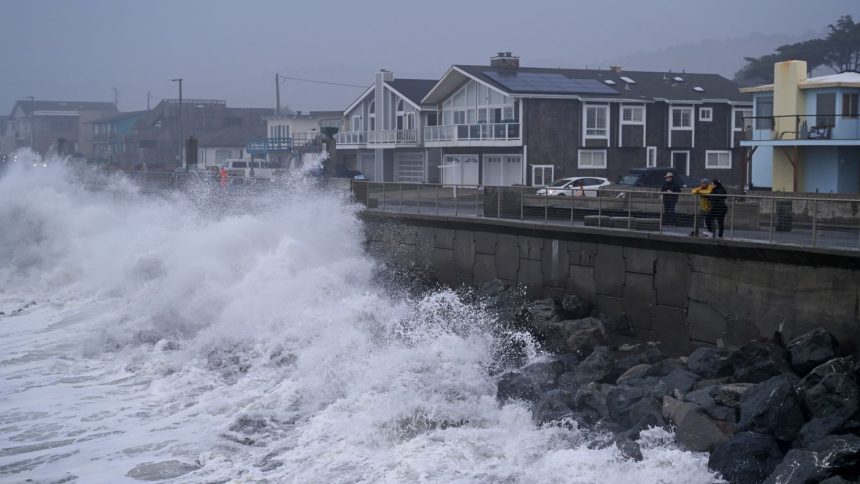 Large waves slam the Municipal Pier of Pacifica, California, on Sunday.