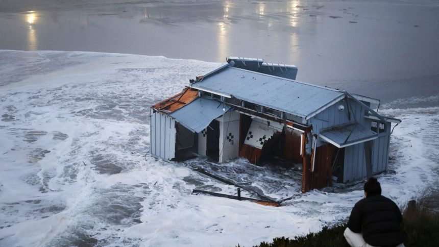 A pier collapsed into the ocean and floated away off the US state of California on December 23, 2024, weather authorities said, as the region was pounded by a powerful storm. Lifeguards rescued two people after the structure in Santa Cruz broke free, firefighters said, while a third person managed to get themselves out of trouble.