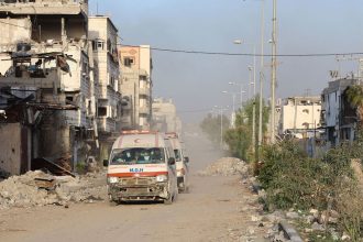 Ambulances transport wounded Palestinians from the Kamal Adwan Hospital to the Al-Shifa hospital in Gaza City on Saturday.