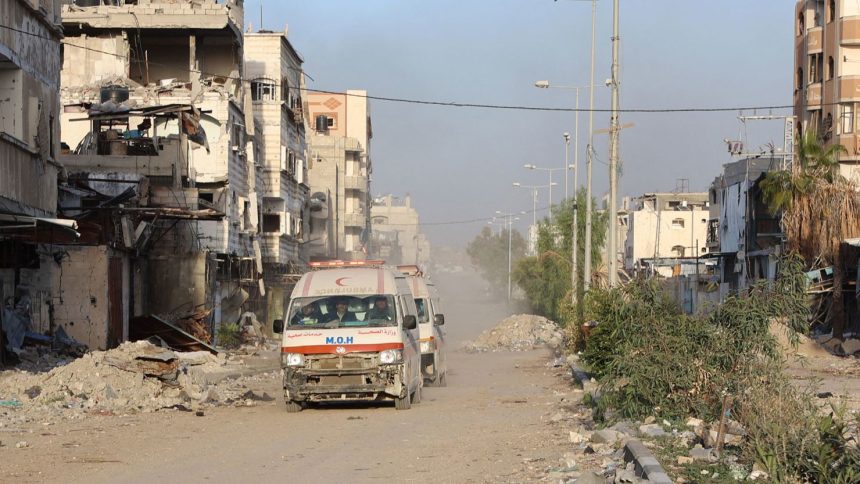 Ambulances transport wounded Palestinians from the Kamal Adwan Hospital to the Al-Shifa hospital in Gaza City on Saturday.