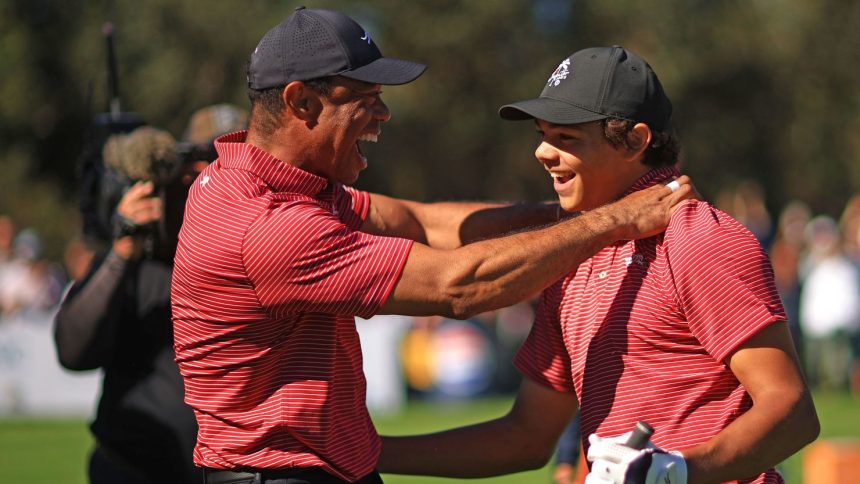 Tiger Woods and his son Charlie Woods celebrate after Charlie hit a hole-in-one at the PNC Championship.