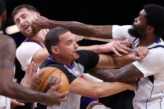 Three players were suspended by the NBA following an on-court altercation between the Dallas Mavericks and Phoenix Suns on Friday.