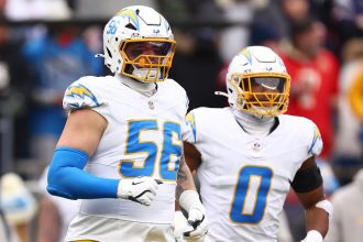 FOXBOROUGH, MASSACHUSETTS - DECEMBER 28: Morgan Fox #56 of the Los Angeles Chargers looks on during the game against the New England Patriots at Gillette Stadium on December 28, 2024 in Foxborough, Massachusetts. (Photo by Maddie Meyer/Getty Images)