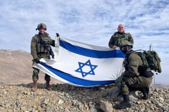 Israeli soldiers stand on Mount Hermon, in Syria, after Prime Minister Benjamin Netanyahu ordered the military to retake a demilitarized zone.