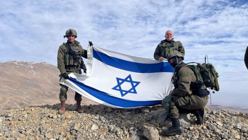 Israeli soldiers stand on Mount Hermon, in Syria, after Prime Minister Benjamin Netanyahu ordered the military to retake a demilitarized zone.