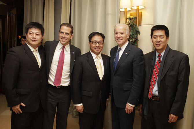 While in China in 2013, Hunter Biden and his father, then-Vice President Joe Biden, pose for a photo with some of Hunter Biden’s Chinese business associates, including BHR Partners CEO Jonathan Li (center) and managing partner Ming Xue (far right). Hunter Biden’s work with the Chinese private equity firm has been scrutinized by the Justice Department and congressional Republicans.