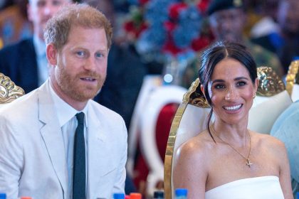 Prince Harry and Meghan pictured in Nigeria in May.