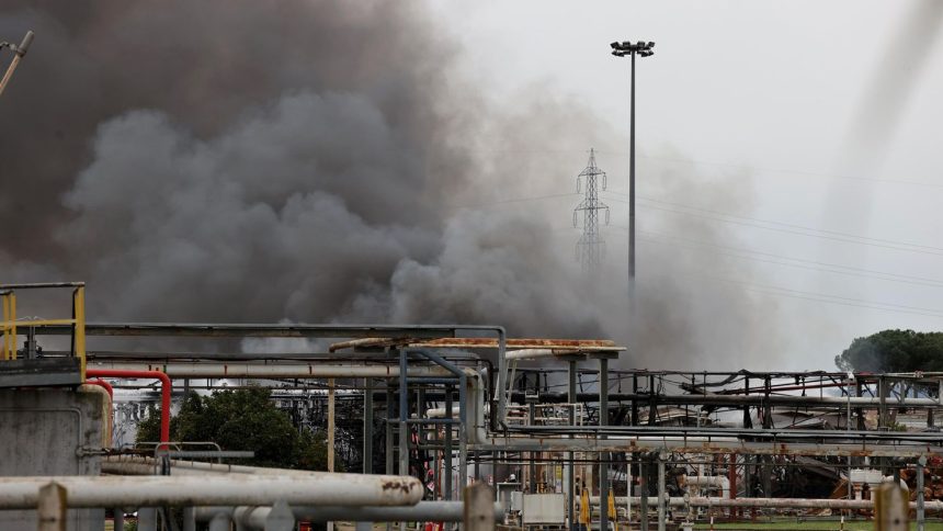 Clouds of smoke rise following an explosion at the ENI facility in Calenzano, near Florence, Italy, on December 9, 2024.