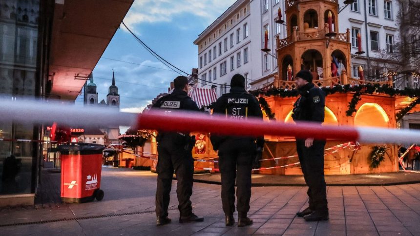 Police patrol next to the targeted Christmas market in Magdeburg, Germany, on Sunday.