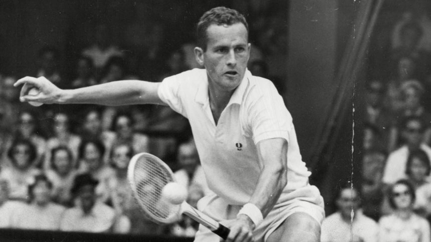 Neale Fraser in action at the 1957 Wimbledon Championships.