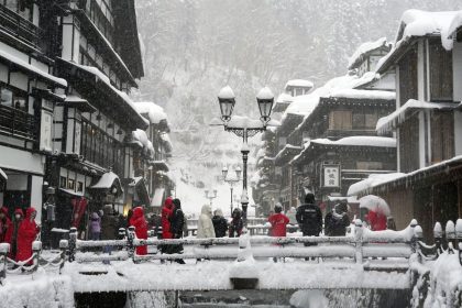 Snow covers Ginzan Onsen, a hot spring resort in Obanazawa, Yamagata Prefecture, northeastern Japan, on December 23, 2024.