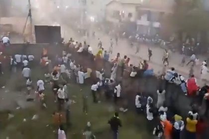 Video geolocated by CNN showed fans scaling a wall as they try to flee from the stadium in Nzérékoré in southeastern Guinea.