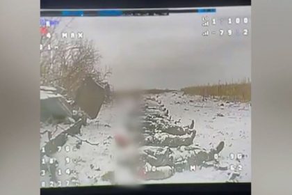 Video posted by a Ukrainian frontline drone unit purported to show the bodies of more than 20 North Korean soldiers lined up in an icy field.