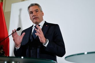 Austrian Chancellor Karl Nehammer addresses a press conference in Vienna, Austria, in November 2024.