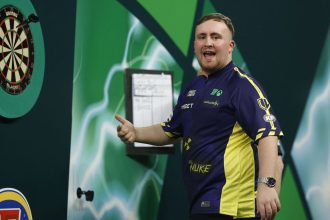 Darts - 2025 PDC World Darts Championship - Alexandra Palace, London, Britain - December 21, 2024 Luke Littler reacts during his second round match against Ryan Meikle Action Images via Reuters/Peter Cziborra