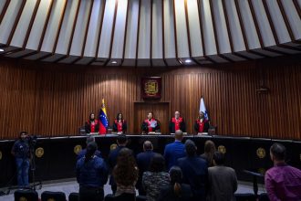 Venezuela's President of the Constitutional Chamber of the Supreme Court of Justice, Tania D'Amelio, reads a statement imposing a fine on TikTok, at the Supreme Court of Justice in Caracas, Venezuela on December 30, 2024.