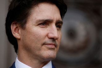 Canadian Prime Minister Justin Trudeau waits to greet Ecuador's President Daniel Noboa in Ottawa, Canada, on March 5.