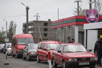 Cars wait in line to exit the self-proclaimed "Moldovan Republic of Transnistria" at Varnita border point with Moldova on Thurssday.