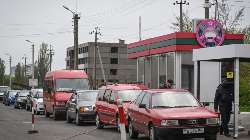 Cars wait in line to exit the self-proclaimed "Moldovan Republic of Transnistria" at Varnita border point with Moldova on Thurssday.