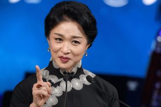 Chinese transgender ballerina and choreographer Jin Xing delivers her acceptance speech during the "Crystal Award" ceremony at the World Economic Forum (WEF) annual meeting in Davos, on January 20, 2020.