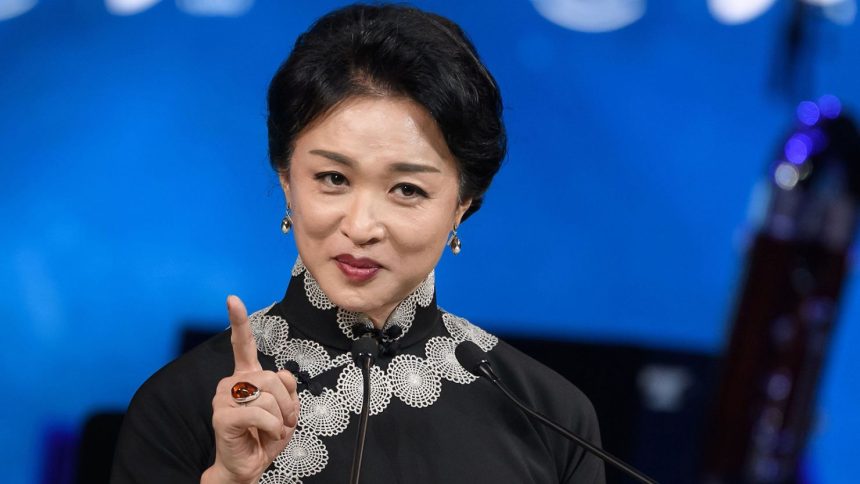 Chinese transgender ballerina and choreographer Jin Xing delivers her acceptance speech during the "Crystal Award" ceremony at the World Economic Forum (WEF) annual meeting in Davos, on January 20, 2020.