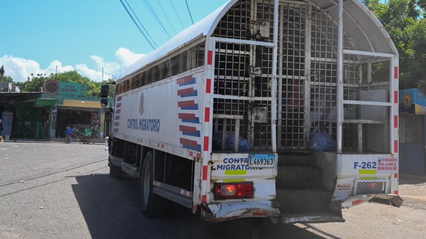 A truck leaves with ilegal Haitian migrants to be deported from the Dominican Republic's Haina Temporary Detention Center, near Santo Domingo, on May 17, 2024.