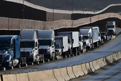 Tractor trailers wait in line at the Otay Mesa Port of Entry, on the US-Mexico border in Tijuana, Baja California, Mexico.