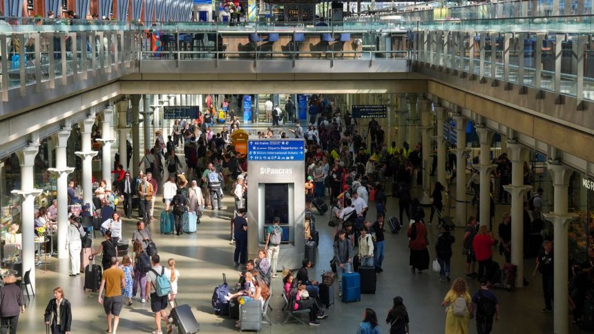 Passengers at St. Pancras station in central London in July 2024.